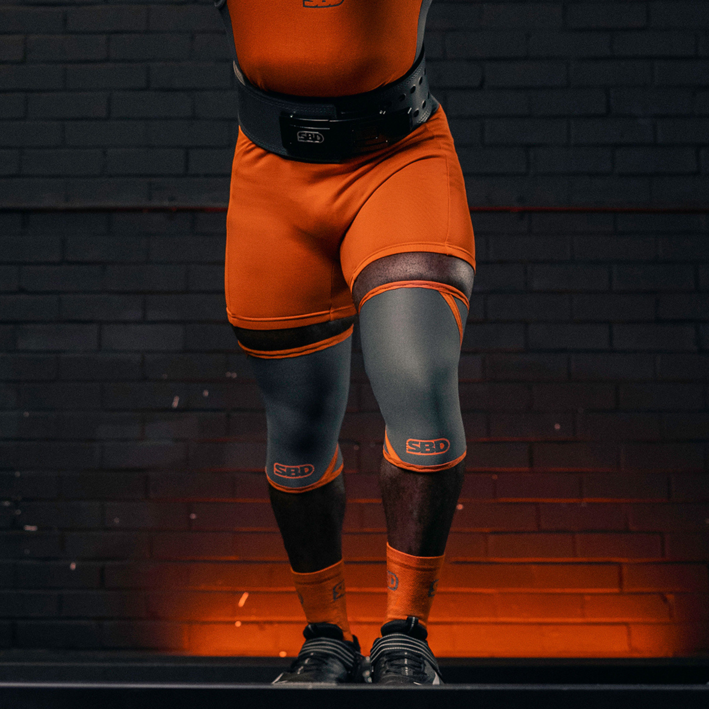 grey/orange knee sleeve